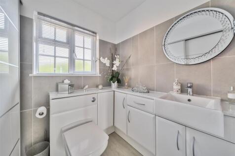 Utility Room/Guest Cloakroom (potential third bath