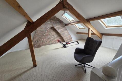 BEDROOM ONE/ATTIC ROOM