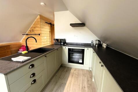 OPEN PLAN KITCHEN/LIVING SPACE