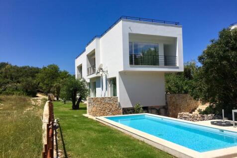Pool and house