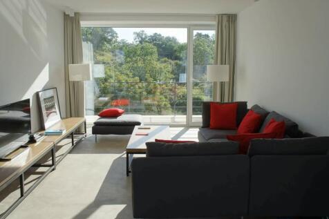 living room looking out onto the pool