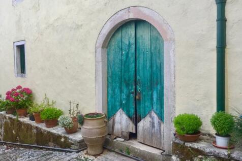 Entrance to workshop room and the old house