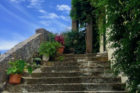 Staircase leading down to the swimming pool