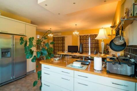 White kitchen to sitting room