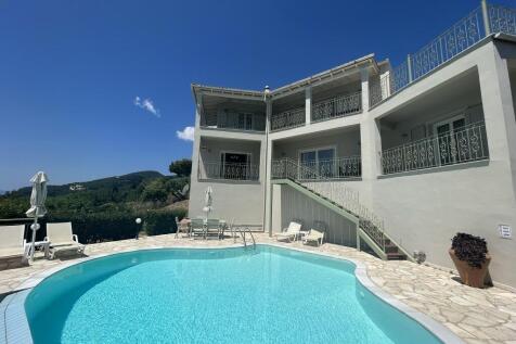 Pool and house