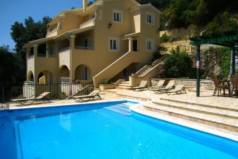 Pool and house