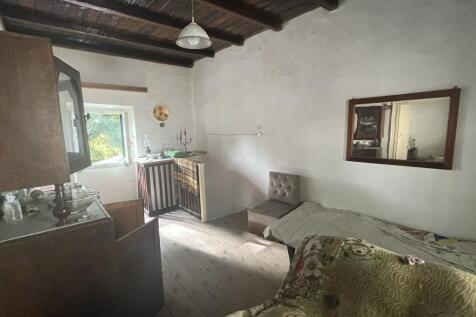 Bedroom with window to the back