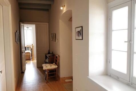 upstairs hall with doors to bodzo balcony