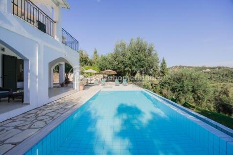 Pool and house