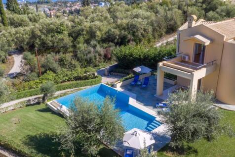 Side shot of pool and house