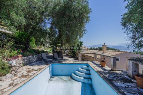 Pool with house to view