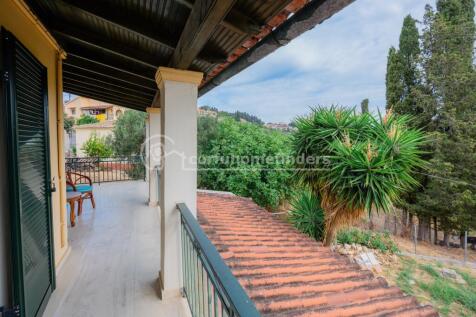 Downstairs back balcony