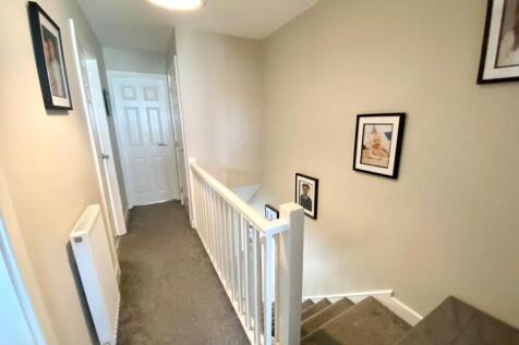 TO THE FIRST FLOOR LANDING