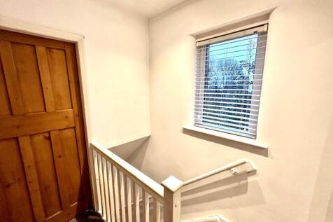 TO THE FIRST FLOOR LANDING