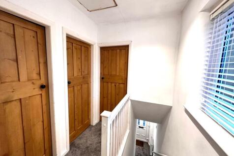 TO THE FIRST FLOOR LANDING