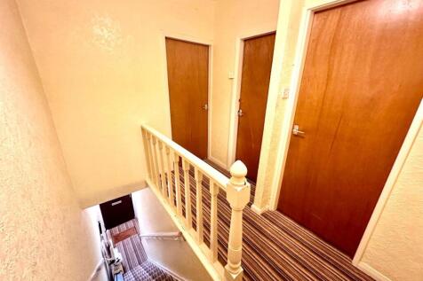 TO THE FIRST FLOOR LANDING