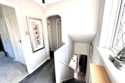 TO THE FIRST FLOOR LANDING