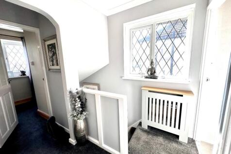 TO THE FIRST FLOOR LANDING