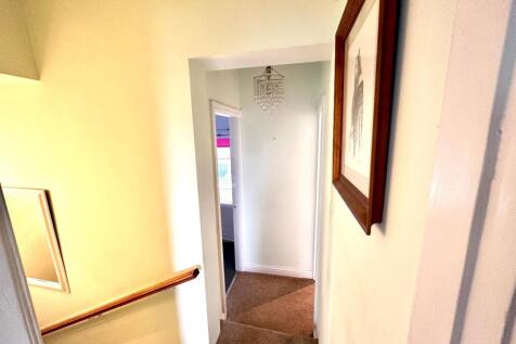 TO THE FIRST FLOOR LANDING