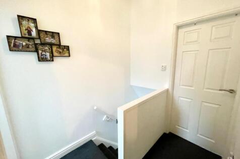 TO THE FIRST FLOOR LANDING