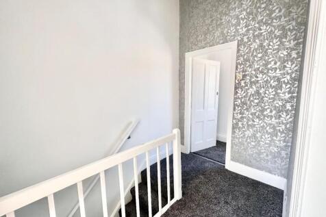 TO THE FIRST FLOOR LANDING