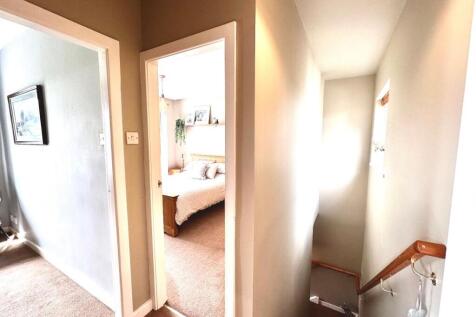 TO THE FIRST FLOOR LANDING