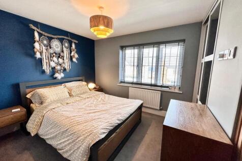 PRIMARY BEDROOM ONE