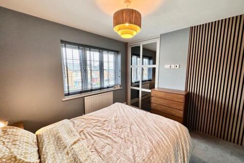 PRIMARY BEDROOM ONE