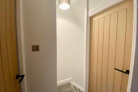 TO THE FIRST FLOOR LANDING
