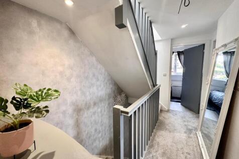 TO THE FIRST FLOOR LANDING