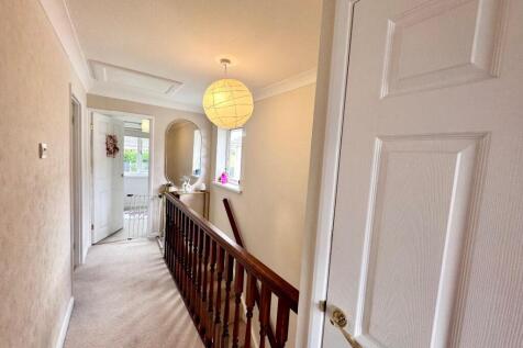 TO THE FIRST FLOOR LANDING