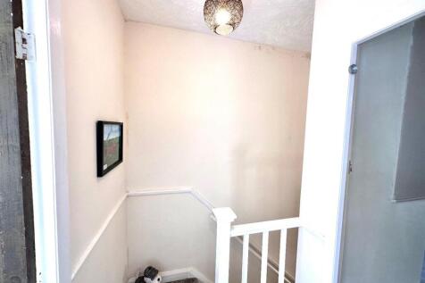 TO THE FIRST FLOOR LANDING