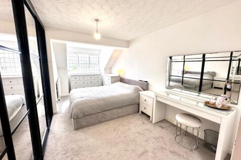 PRIMARY BEDROOM WITH EN-SUITE