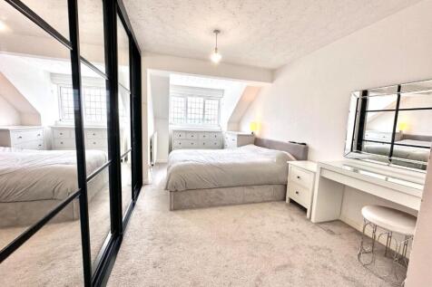 PRIMARY BEDROOM WITH EN-SUITE