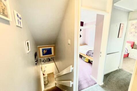 TO THE FIRST FLOOR LANDING