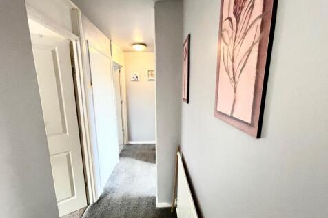 TO THE FIRST FLOOR LANDING