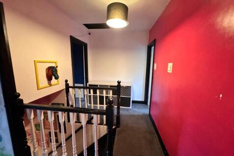 TO THE FIRST FLOOR LANDING