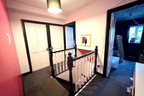 TO THE FIRST FLOOR LANDING