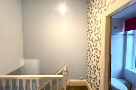 TO THE FIRST FLOOR LANDING