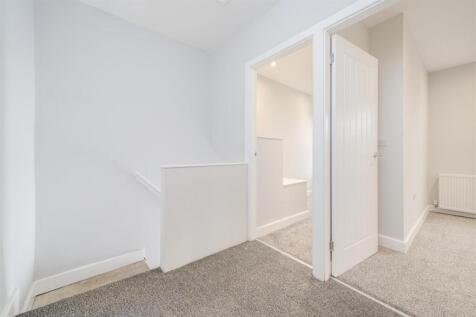 TO THE FIRST FLOOR LANDING