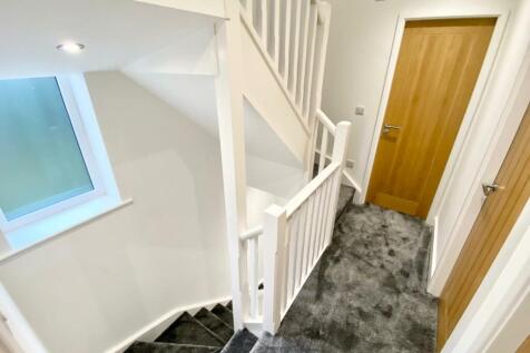 TO THE FIRST FLOOR LANDING