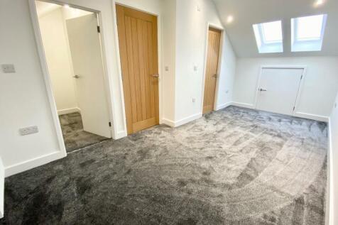 PRIMARY BEDROOM WITH EN-SUITE