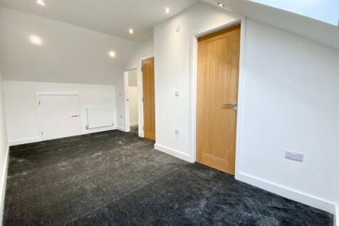 PRIMARY BEDROOM WITH EN-SUITE