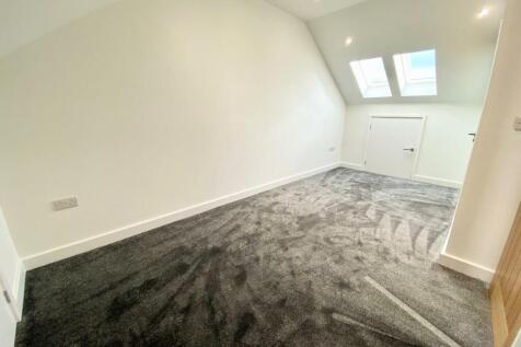 PRIMARY BEDROOM WITH EN-SUITE