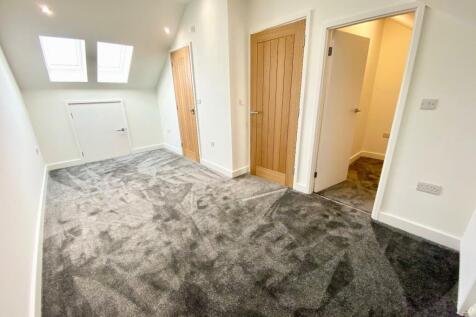 PRIMARY BEDROOM WITH EN-SUITE