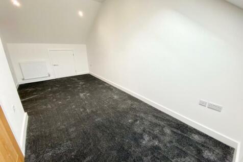 PRIMARY BEDROOM WITH EN-SUITE