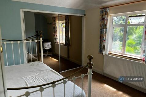 Bedroom With Builtin Sliding Wardrobe