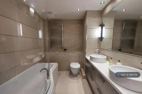 Nsuite Bathroom With His And Hers Sinks.