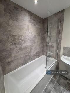 Upstairs Fully Tiled Bathroom