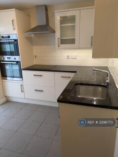 Kitchen With Built In Double Oven And Microwave